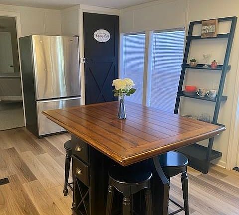 Open Kitchen with stackable laundry.