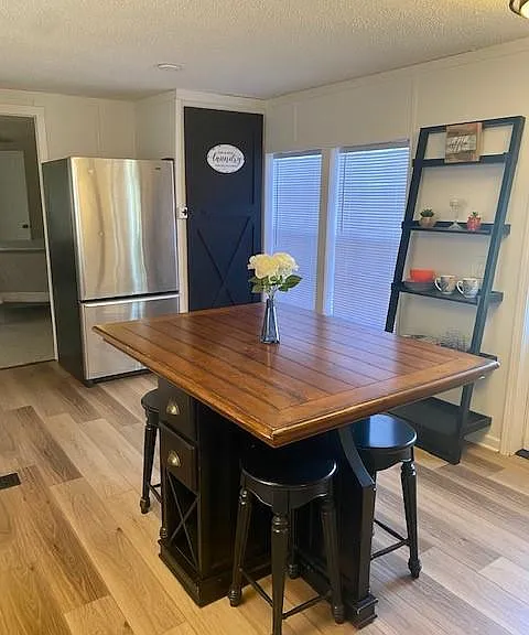 Open Kitchen with stackable laundry.