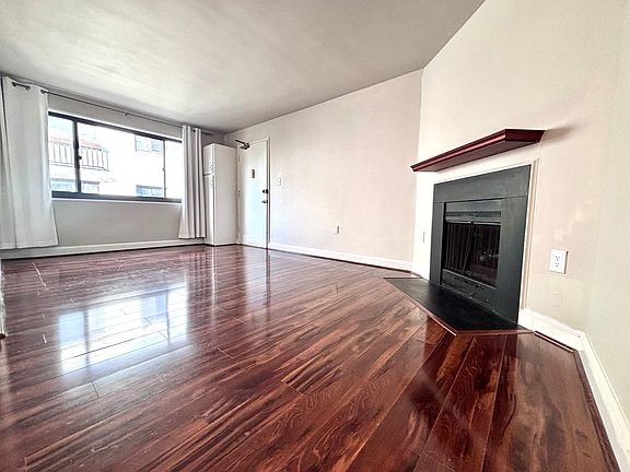 The living and dining area features a chimney.