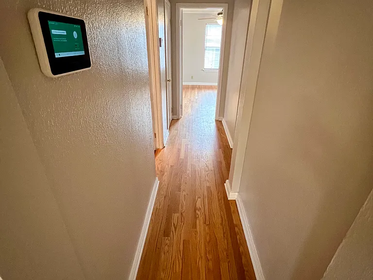 Hallway to Master Bedroom and Laundry Room