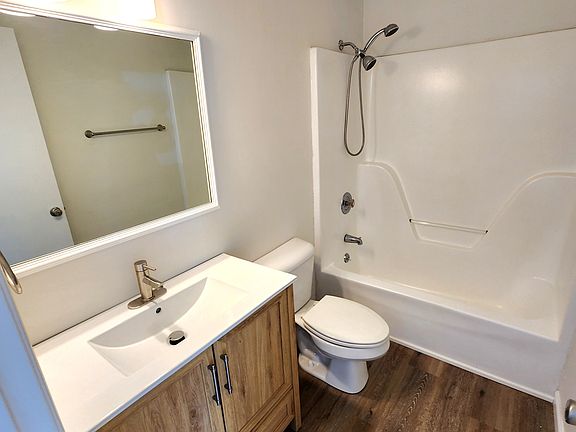 Updated bathroom with new fixtures, vanity and sink. Shower/tub combo.