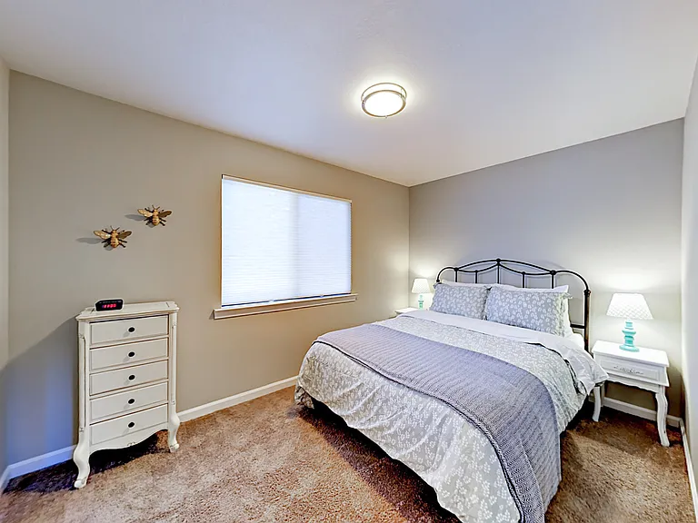 Guest Bedroom with queen sized bed.