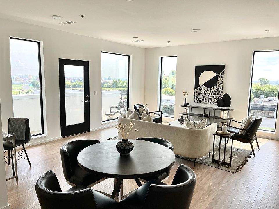 Striking oversized windows throughout the apartment. Spacious open space to have a living room, dining room and desk.