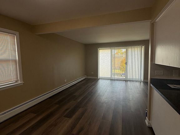 Dinning room and living room with balcony
