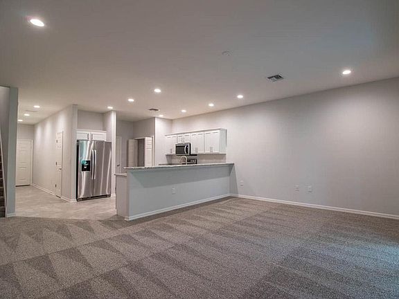 Open living area with spacious great room - New townhome for sale in Sarasota