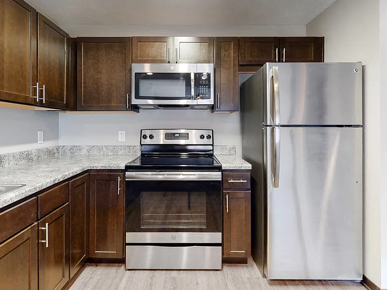 Modern finishes and generous prep space create a comfortable setting for everything from quick meals to weekend hosting.