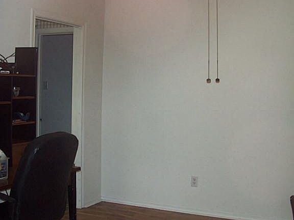Dining area or study that is located just off the front entry way that leads to either the kitchen a