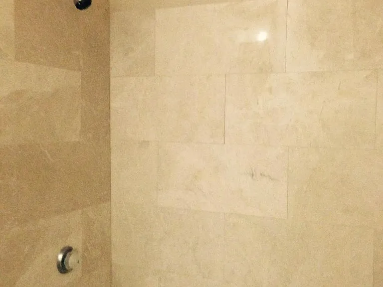 New bathtub with marble surround
