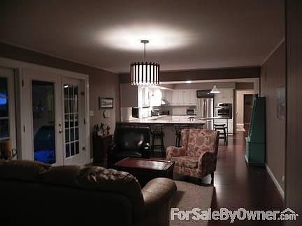 Family Room
						:
						Family room off the kitchen, with door to the backyard