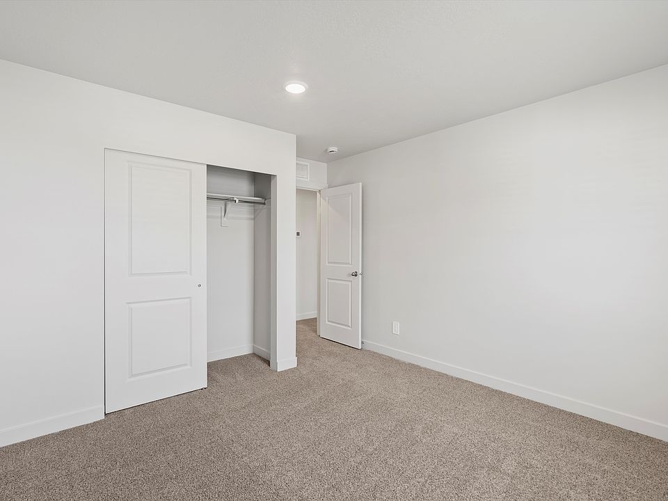 The Pine floorplan interior image taken at a Meritage Homes Community in Tooele, UT.
