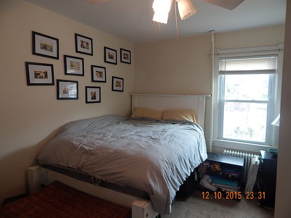 Bedroom (view # 1) w/ ceiling fan