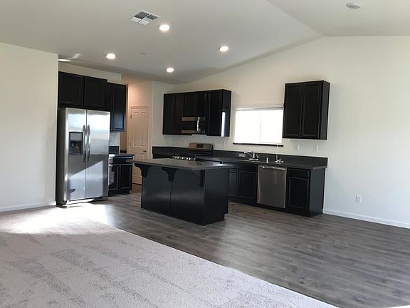 LIGHT FILLED GREAT ROOM WITH UPGRADED FLOORING