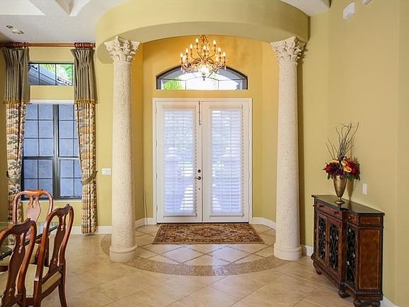 Elegant entry with fine upgrades welcome you into this masterfully built home.