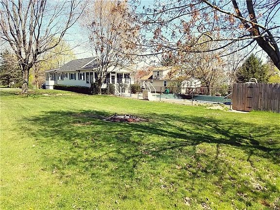 Large flat yard for entertaining in addition to the pool.