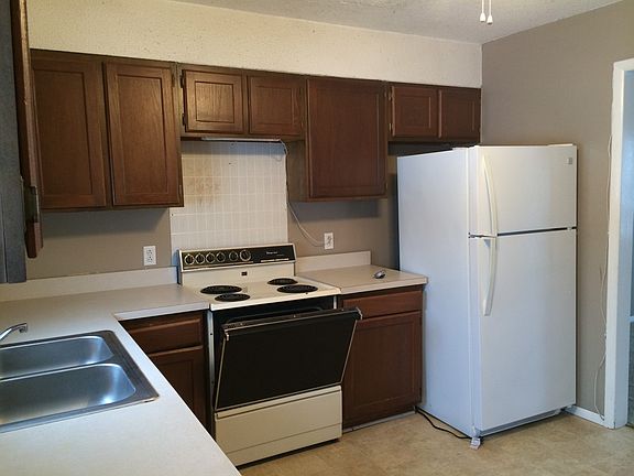kitchen includes range/stove and fridge
