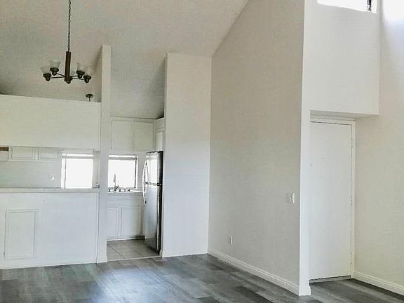 very spacious living room with high ceiling
