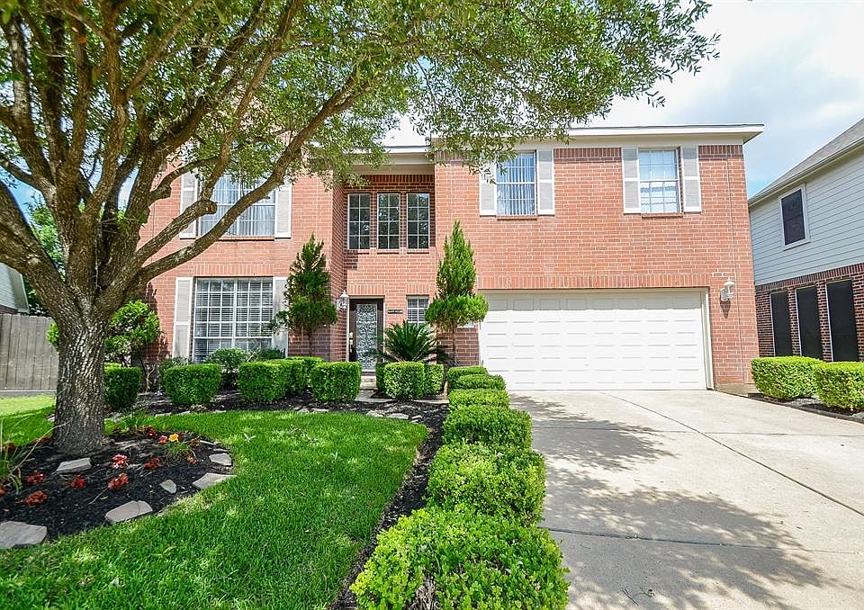 Nice landscaped home has great curb appeal