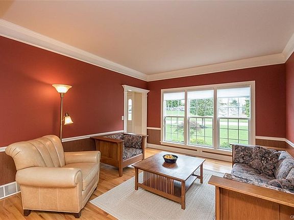 Hardwoods throughout home accept in bedrooms.