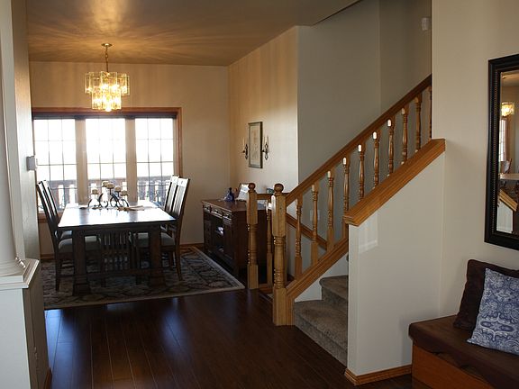 Entry looking into Dining Room and stairs leading up to 3-Bedrooms & 2-Baths.