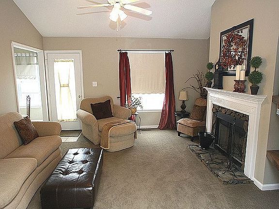 Stone work was added to enhance the fireplace. New carpet is in the fm room.