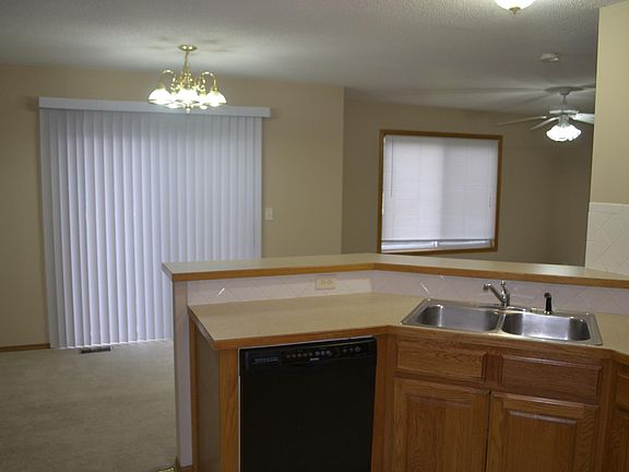 Kitchen view that overlooks into the dining area and living 