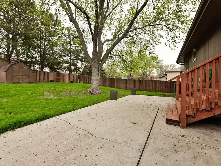 Back of Home, Fully Fenced, Patio Area with Planters and Shed