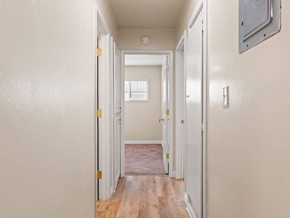 Hallway down to Bath, bedroom 2 and master