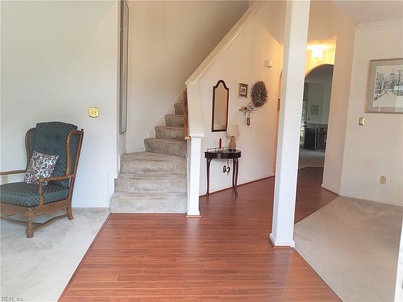 You can see the TLC as you enter the Foyer w/ beautiful laminate flooring.