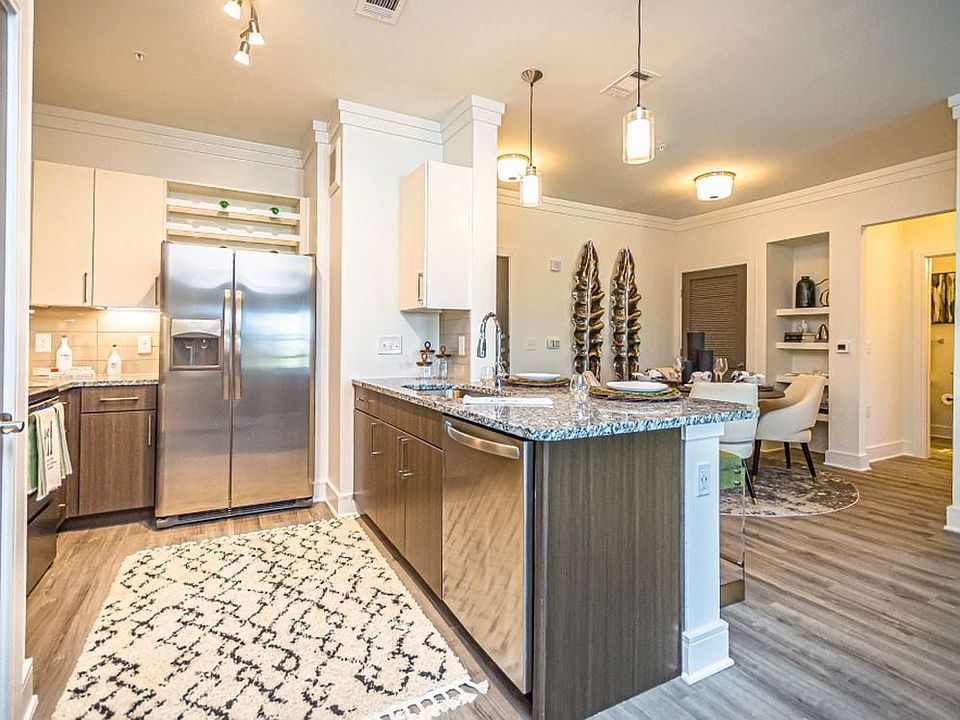 Kitchen and living room with hard surface flooring