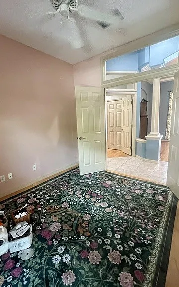 Work from home with ease in this large den space adjacent to the front door and in close proximity to the primary bedroom. Hardwood flooring
