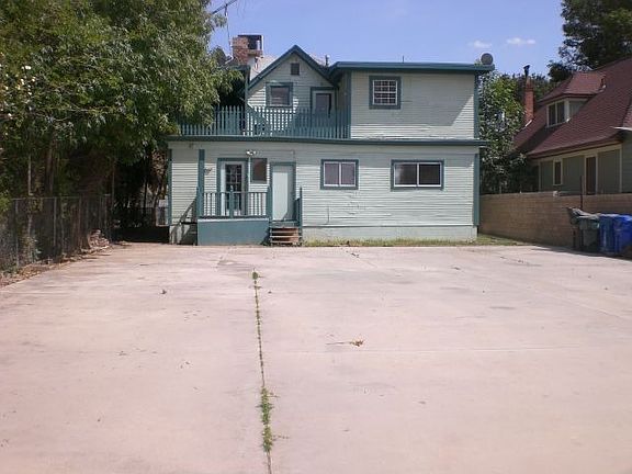 Entire Back Side of Home Cemented with Rear Access