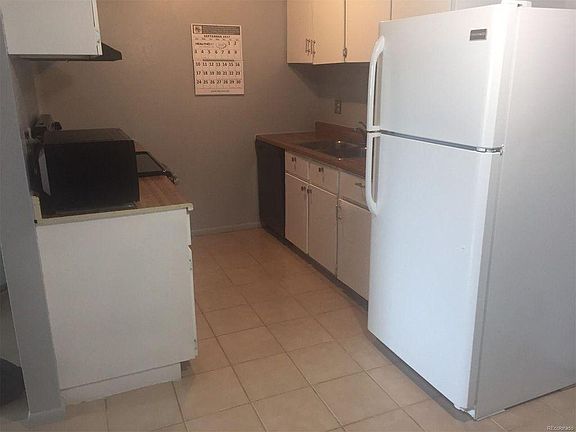 Kitchen - tiled and brand new stove