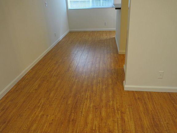 Dining room. (Nice wood flooring thought downstairs).