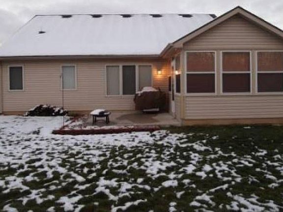 Back of house and sunroom