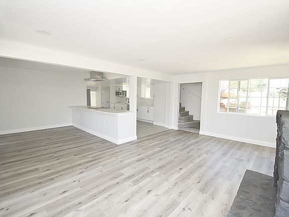 LIVING ROOM, DINING ROOM AND KITCHEN