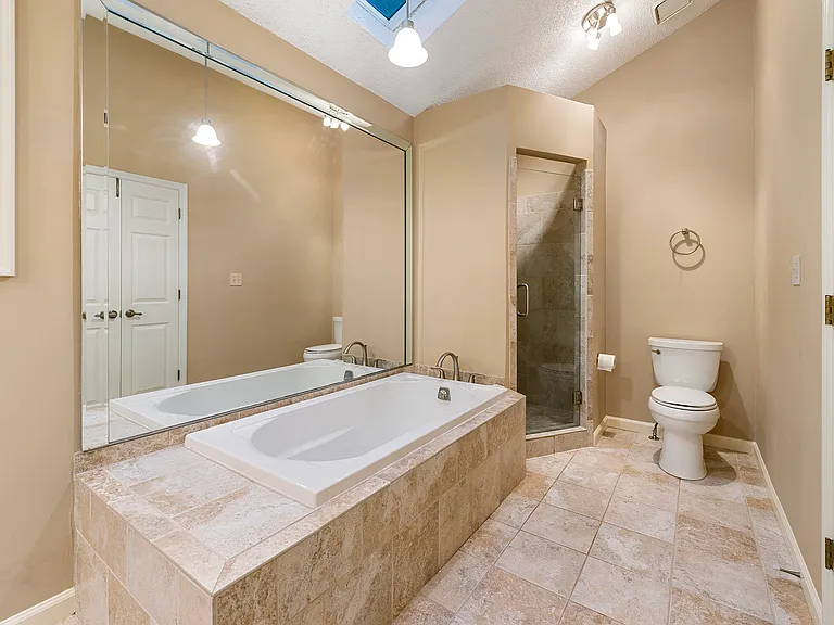 Master bathroom, shower and bathtub