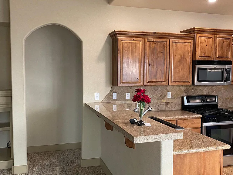 Kitchen/ Entryway towards Master Bedroom
