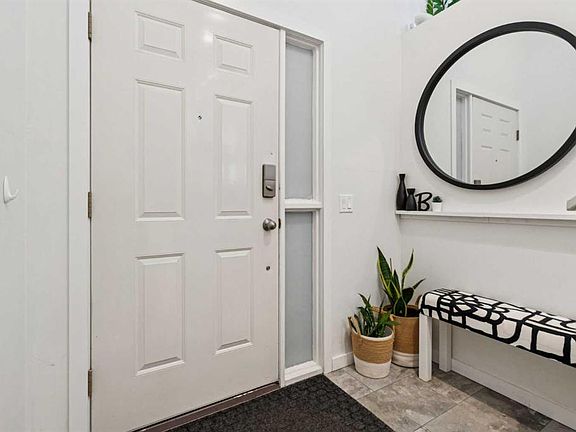 5th image of 65 E Tararidge Close NE