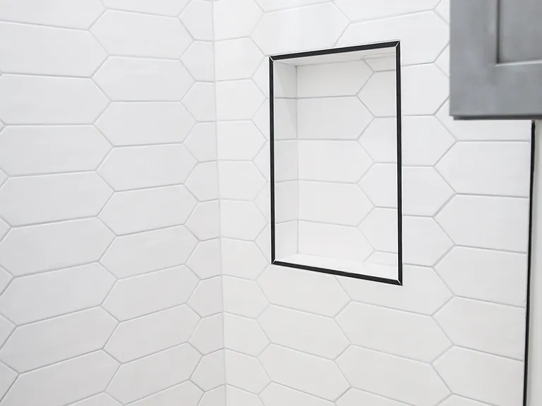 Shower in first bathroom.