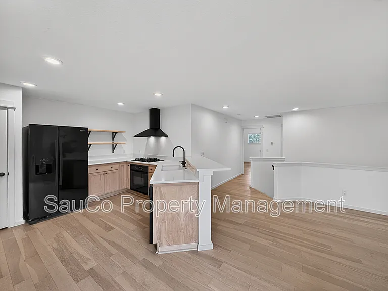 7399 NE Stonewater St — Photo 15