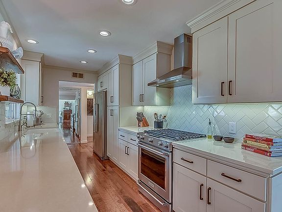 High end gas stove with custom hood