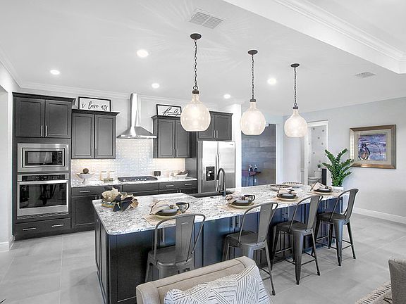 Wellington Model Floor plan at On Top of the World Communities Kitchen