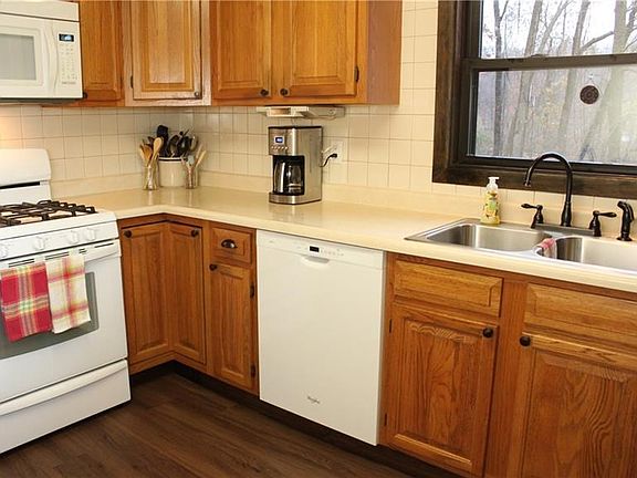 Plenty of cabinets in this fully equipped kitchen