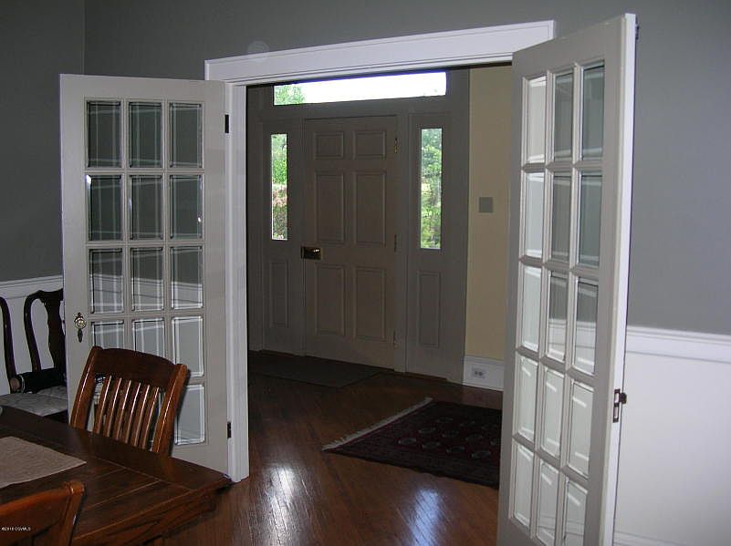 DINING ROOM #3- ORIGINAL FRENCH DOORS LEADING TO MAIN FOYER