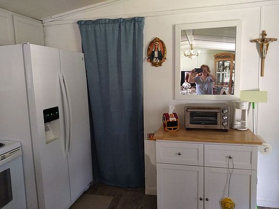 kitchen with door to laundry