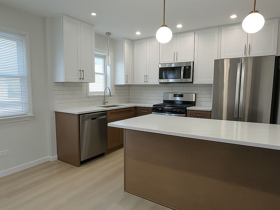 Kitchen with island, quartz counters, Stainless appliance