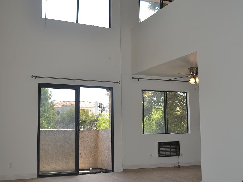 Main Living area with high ceilings and lots of light
