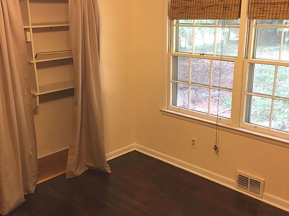 Office/Small Bedroom with built in bookshelves and closet