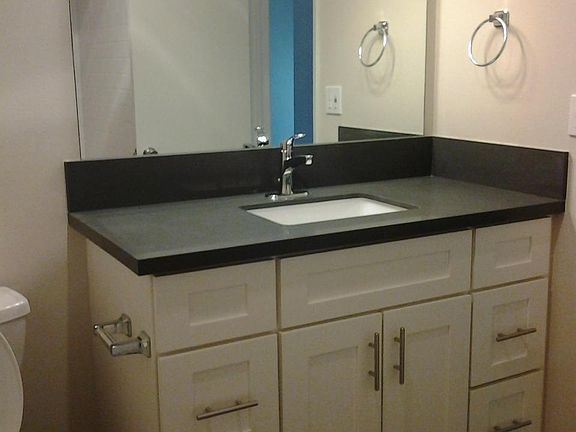 one of the two full bathrooms, both are completely upgraded