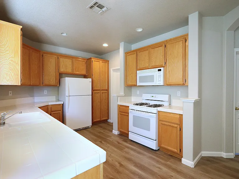 Kitchen with appliances and ample cabinets and counter space